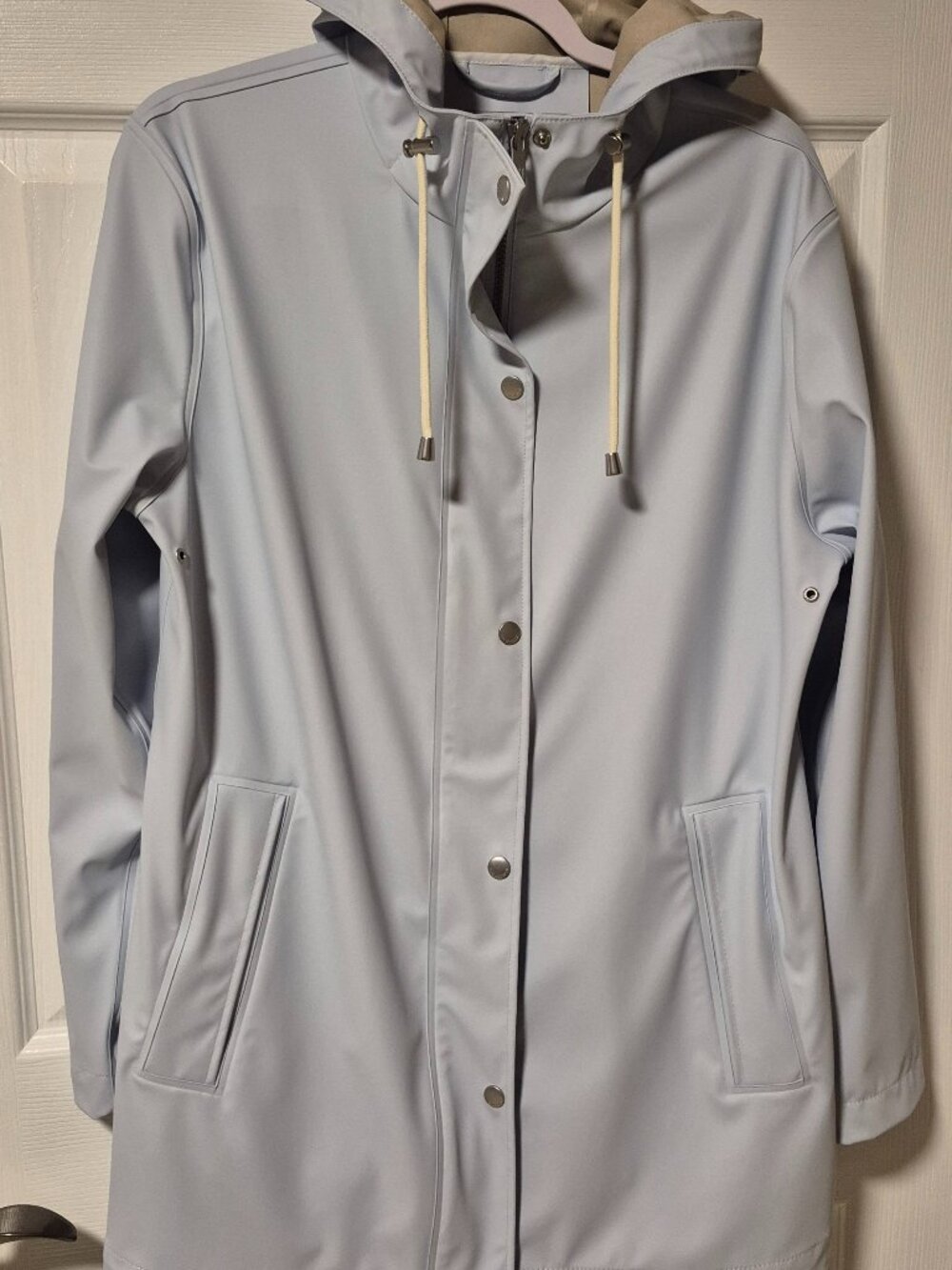 ILSE JACOBSEN RAINCOAT.   Size 38 ( Fits to a size 12).  NWOT.  ICE BLUE